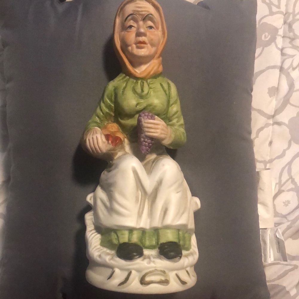 Vintage Ceramic Figurine with Green and White Attire